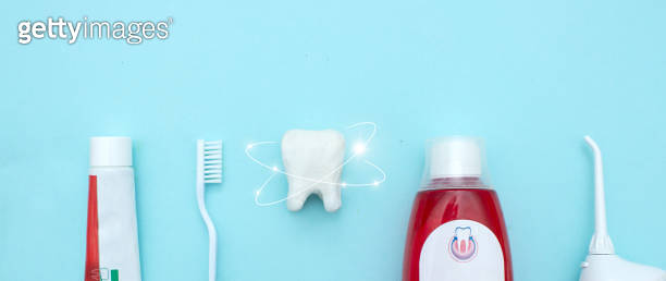 Close up of a toothbrush, toothpaste, irrigator, mouthwash for teeth ...