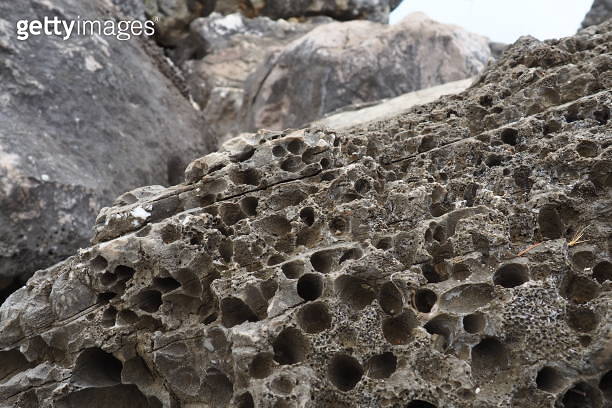 Volcanic stones. Spongy cellular loose airy porous stone material ...