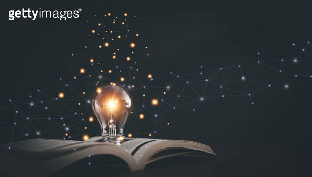 Glowing light bulb on a book, Inspiring from read concept, Educational ...