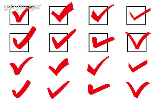 Various check marks that look like they were written with a thick pen ...