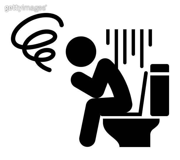 Constipated person sitting on the toilet seat 이미지 (1565375527) 게티이미지뱅크