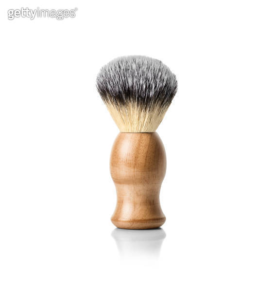 Classic shaving brush with raccoon fur isolated on white 이미지