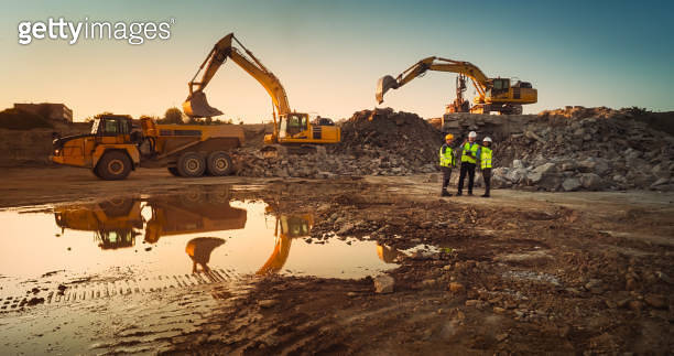 Aerial Drone Shot Of Construction Site With Heavy Machinery On Sunny ...