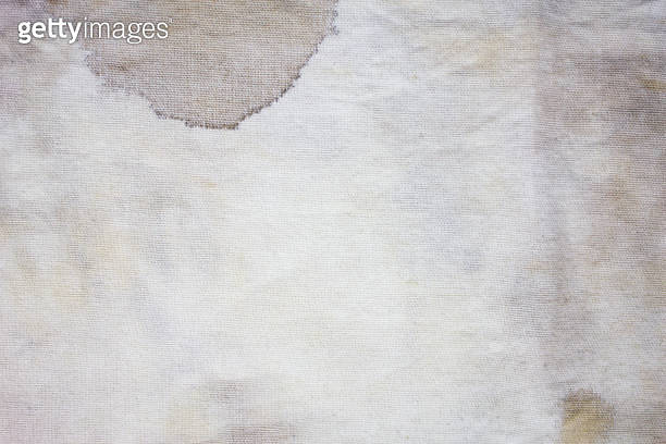 Dirty rag. Stained fabric, the surface of the fabric is stained. Fabric ...