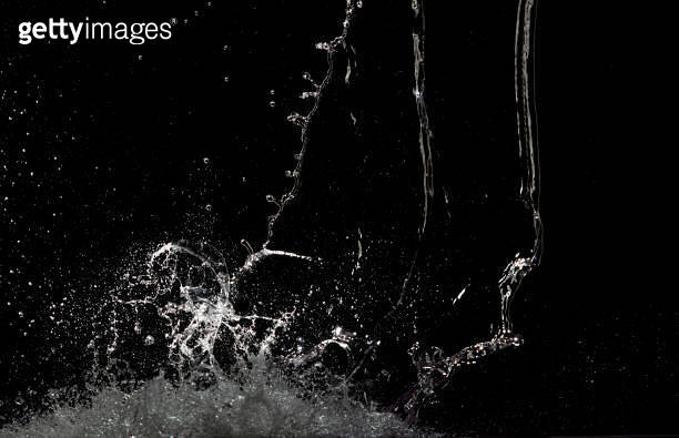 Exploding Water Droplet Blur Defocus Image of Water hit wall ground, explode into drop droplet ...