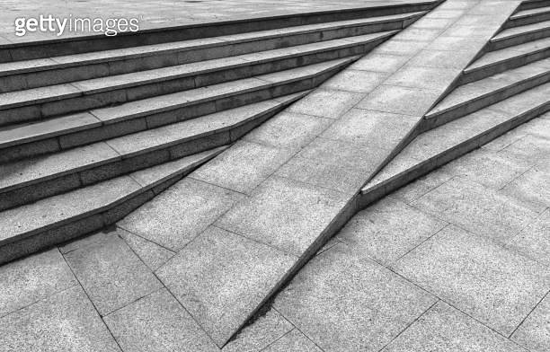 Gray granite stairs with a ramp, abstract outdoor urban architecture ...
