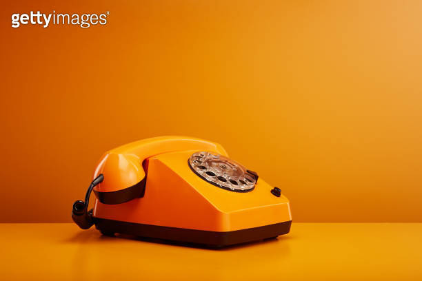 Téléphone Vintage Orange – Fonctionnel, Bon état