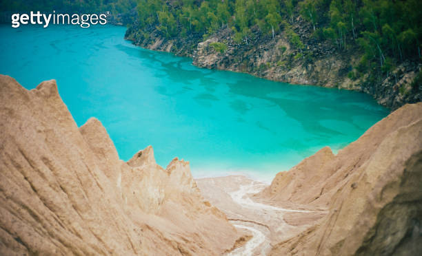 The shores of the mountain lake, the blue water in the lake. Turquoise ...