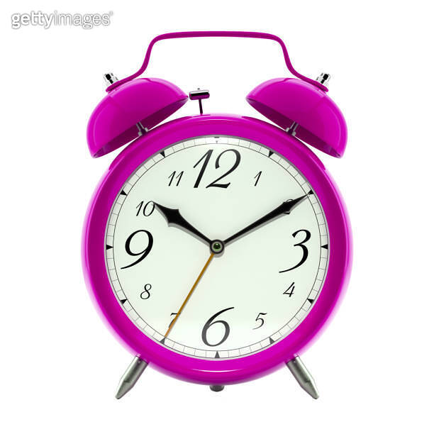 Alarm clock, vintage style hot pink color clock with black hands. 이미지