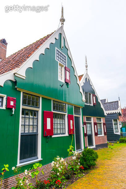 Traditional Dutch houses and windmills in Zaanse Schans. The Zaanse ...