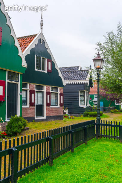 Traditional Dutch houses and windmills in Zaanse Schans. The Zaanse ...