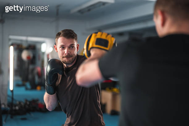 Caucasian Male Practicing New Boxing Sequences In A Gym (1714038074 ...