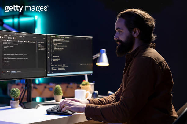 Remote IT worker testing and debugging code for software applications ...