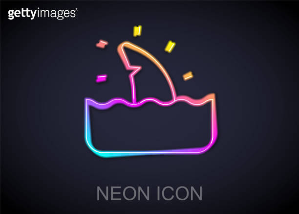 Glowing neon line Shark fin in ocean wave icon isolated on black ...