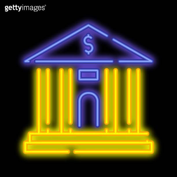 Neon glowing facade of bank building. Exterior of financial institution ...