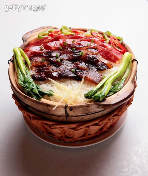 traditional local hot clay pot fried rice with chinese waxed meat ...