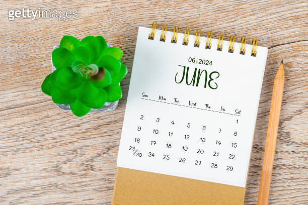 June 2024 monthly desk calendar and pencil with plant pot decoration ...
