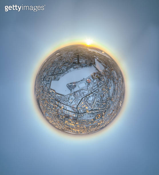 Winter Sphere Aerial winter city view with crossroads and roads, houses, buildings ...
