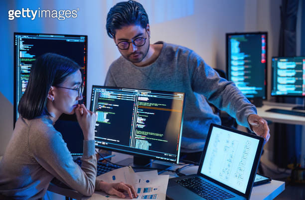 asian and Indian Developer devops team discussion about coding promgram ...