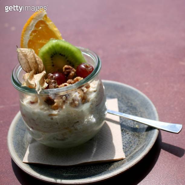 Bircher muesli with nuts, grated apple, oat flakes. Decorated with