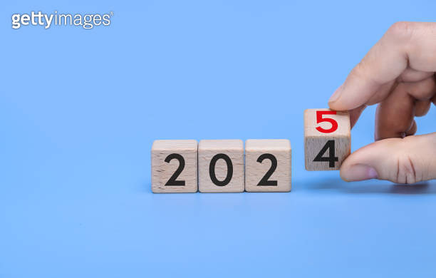 Symbolize the transition from 2024 to 2025 with Wooden Blocks for a 