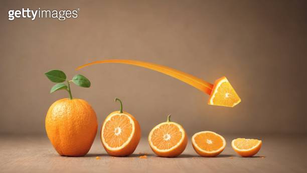 Decreasing Graph And Arrow On Orange Fruit Slice Stock Board ...