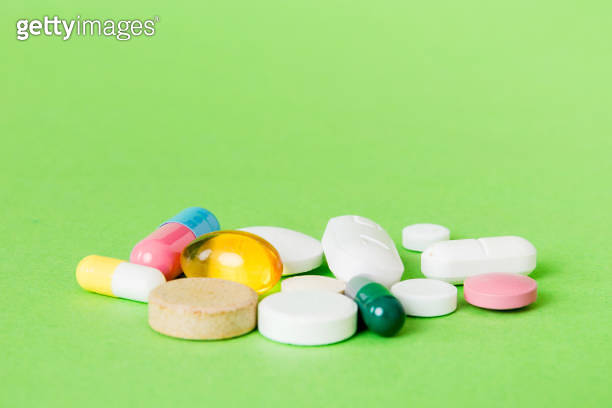 Many different colorful medication and pills perspective view. Set of ...