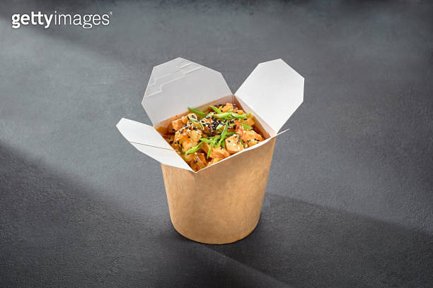 Rice glass noodles with chicken fillet in a wok box, a convenient ...