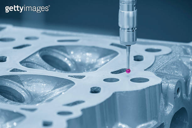 The multi axis CMM machine measuring the aluminum cylinder head parts ...