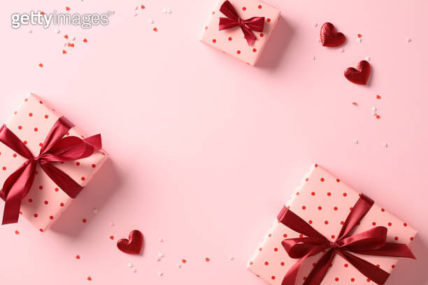 Valentine's Day flat lay composition with gift boxes and hearts on ...